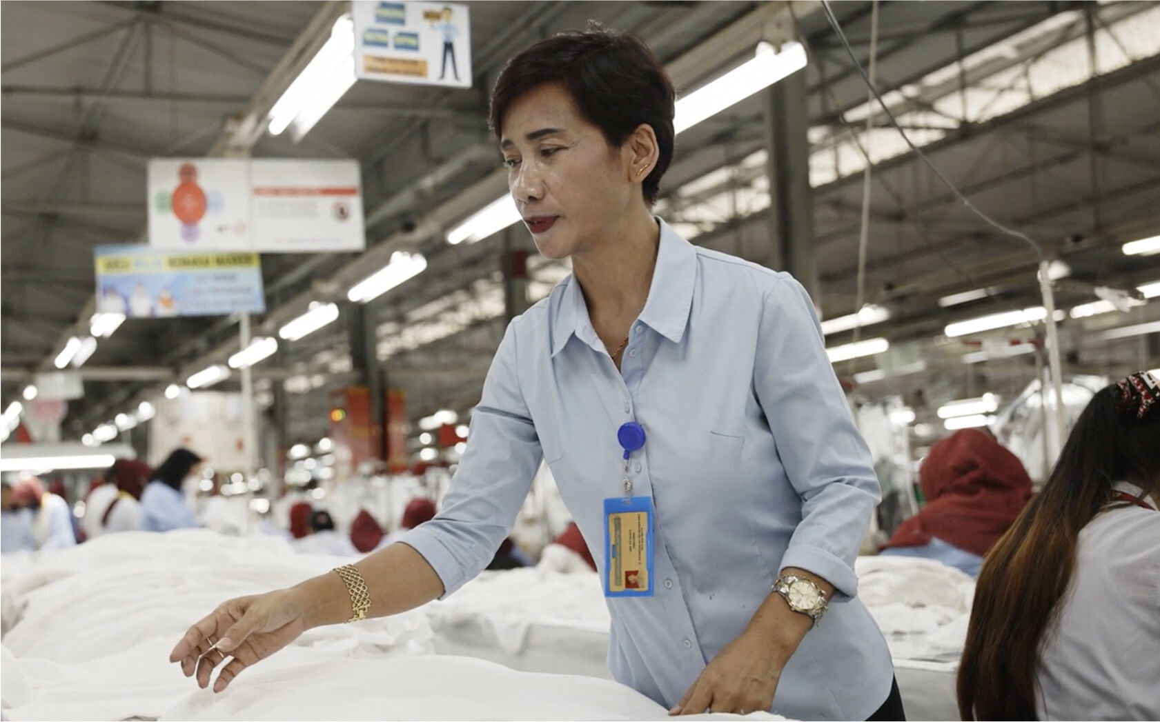 rancher herding sheep on horseback