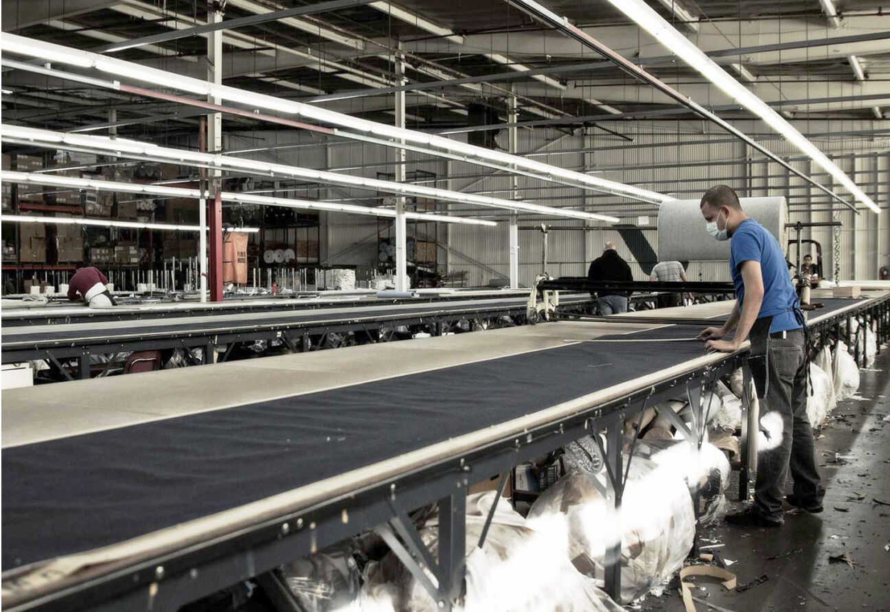 Man working at a garment factory.