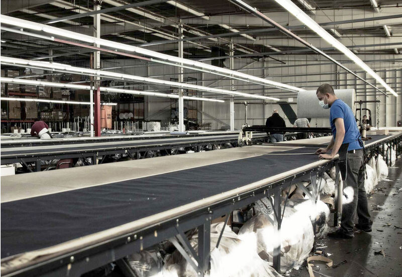 Man working at a garment factory.
