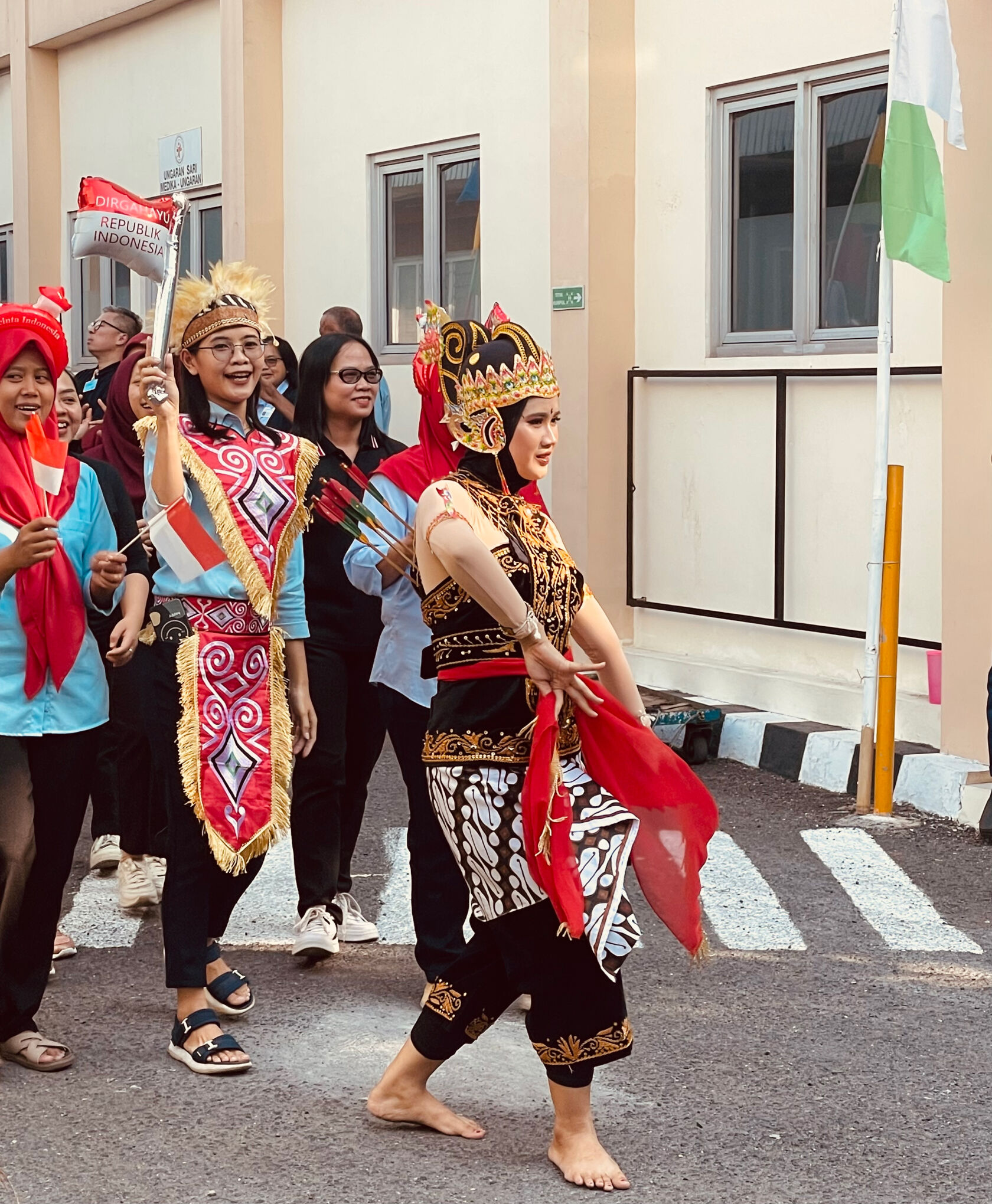 Workers in costume celebrating Indonesian Independence.